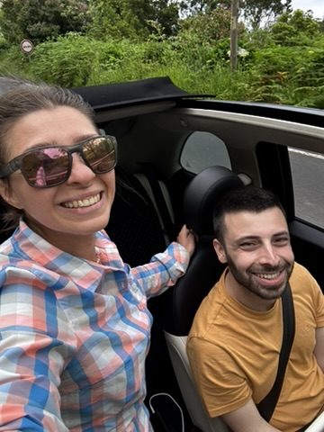 Anca smiling in the Azores — living her best life, despite (or because of) the expired licence situation