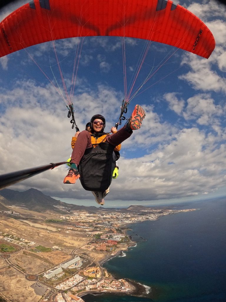 Tandem paraglider airborne over the Tenerife coastline