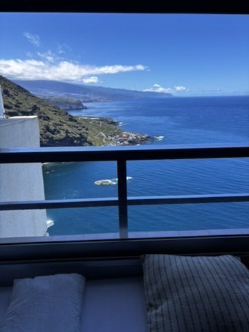 View from Anca's Tenerife accommodation — terrace or window looking out over coast, sea and sky