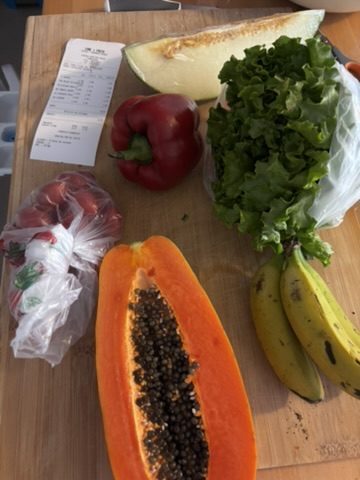 Anca cooking in a kitchen in Tenerife, fresh produce and local ingredients on the counter