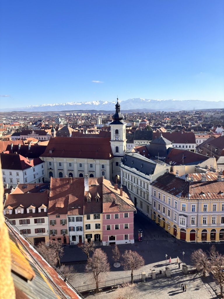 Panoramic view of Sibiu old town with its terracotta rooftops and church tower, Transylvania, Romania